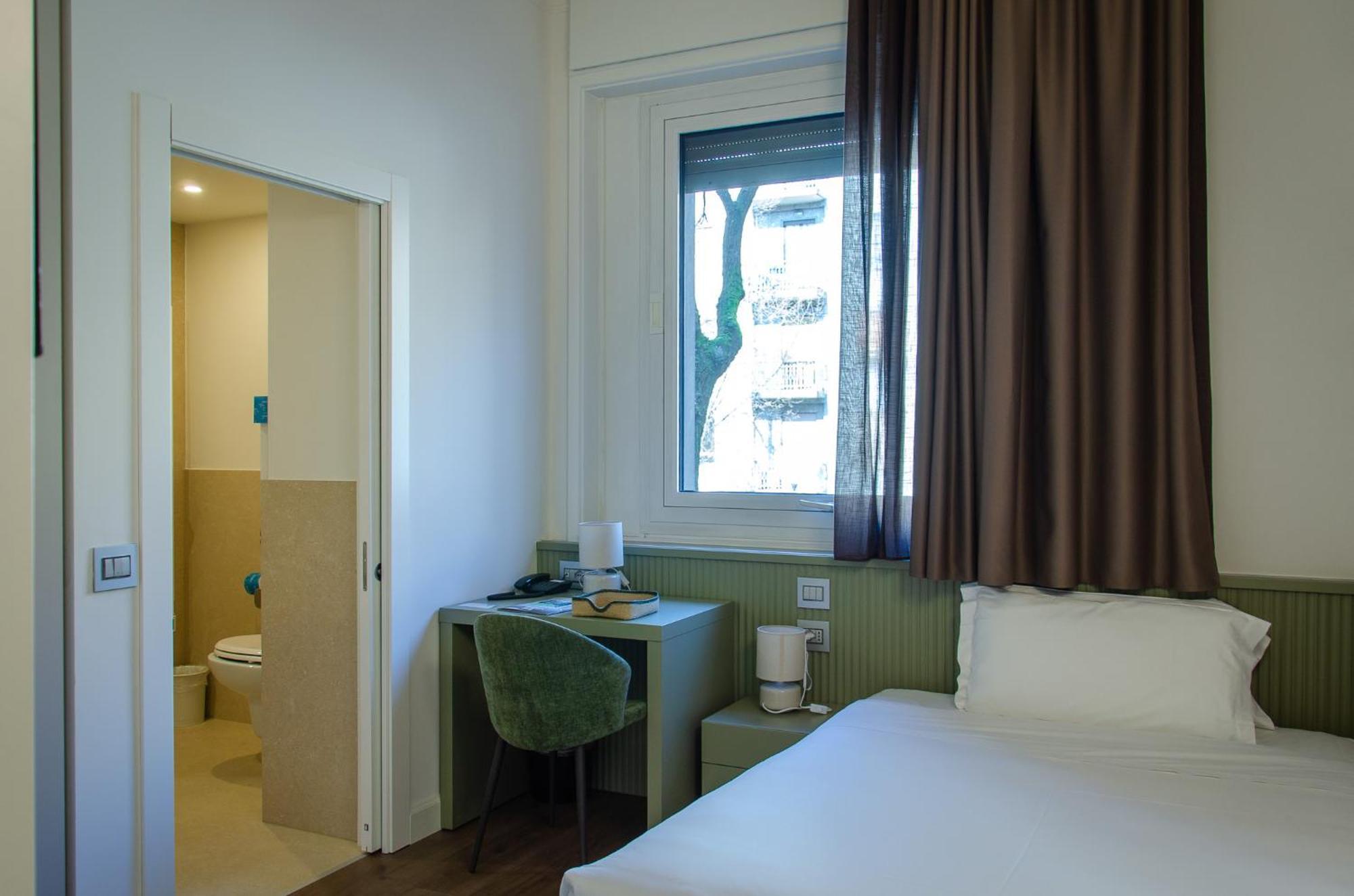 Quarto com Cama Queen-size